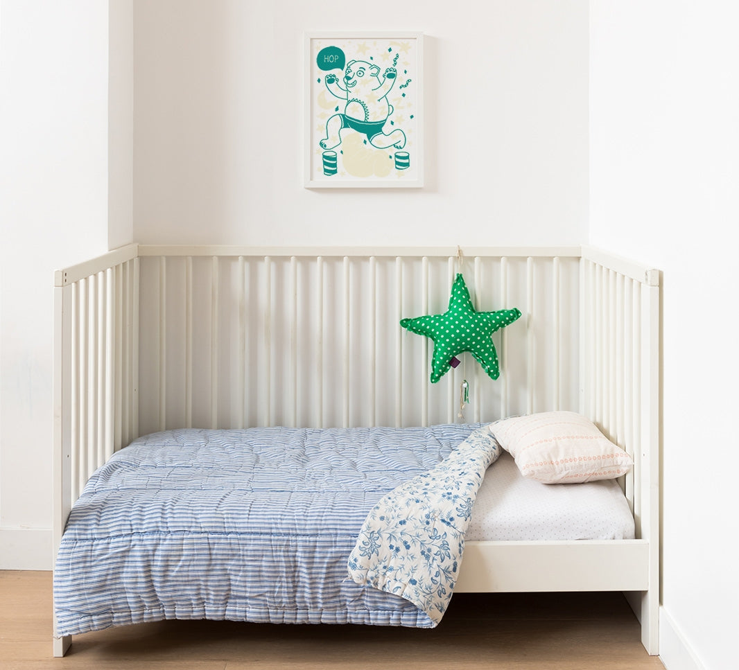 Glow in the dark poster of grizzly bear, against the wall